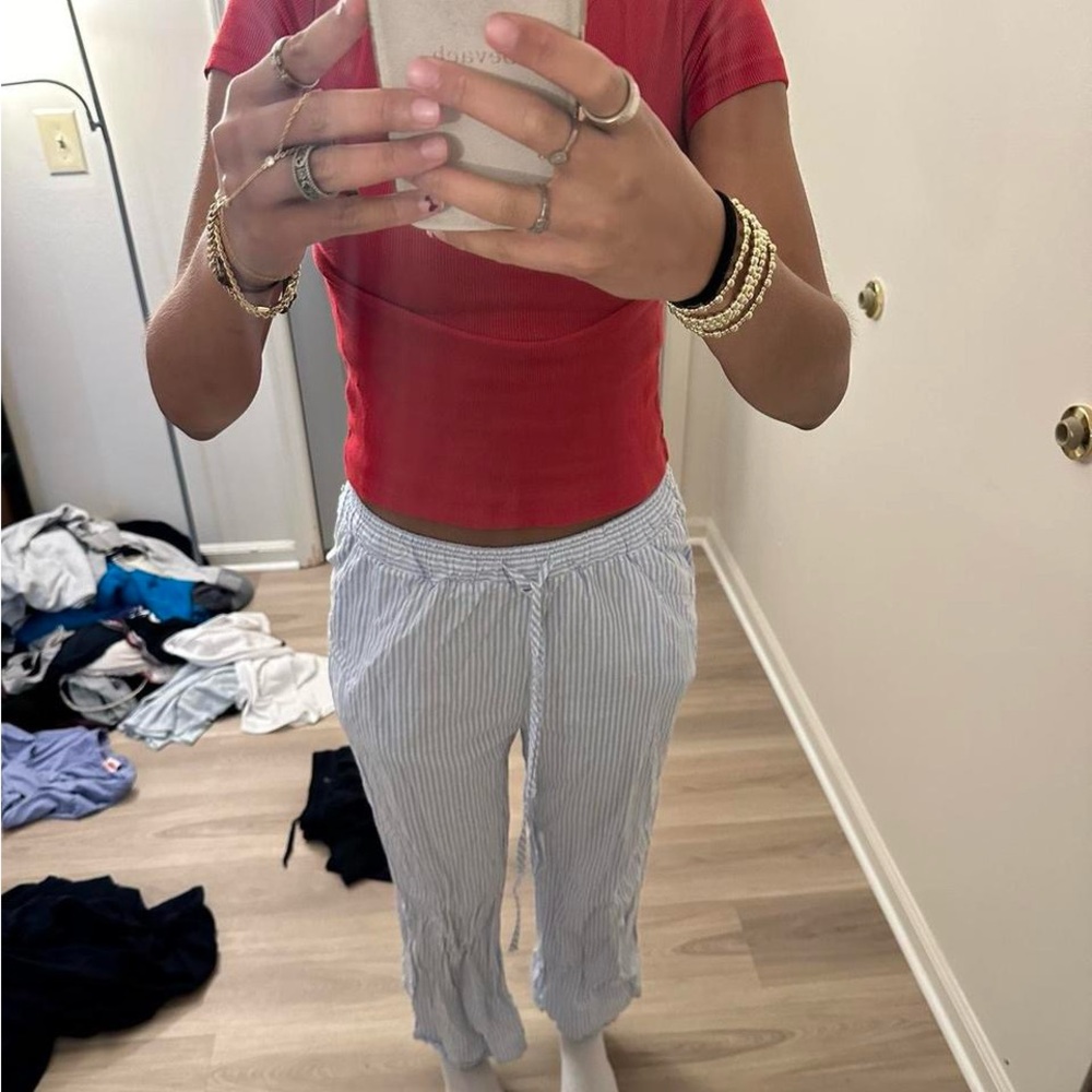 Red Top and Striped Pants